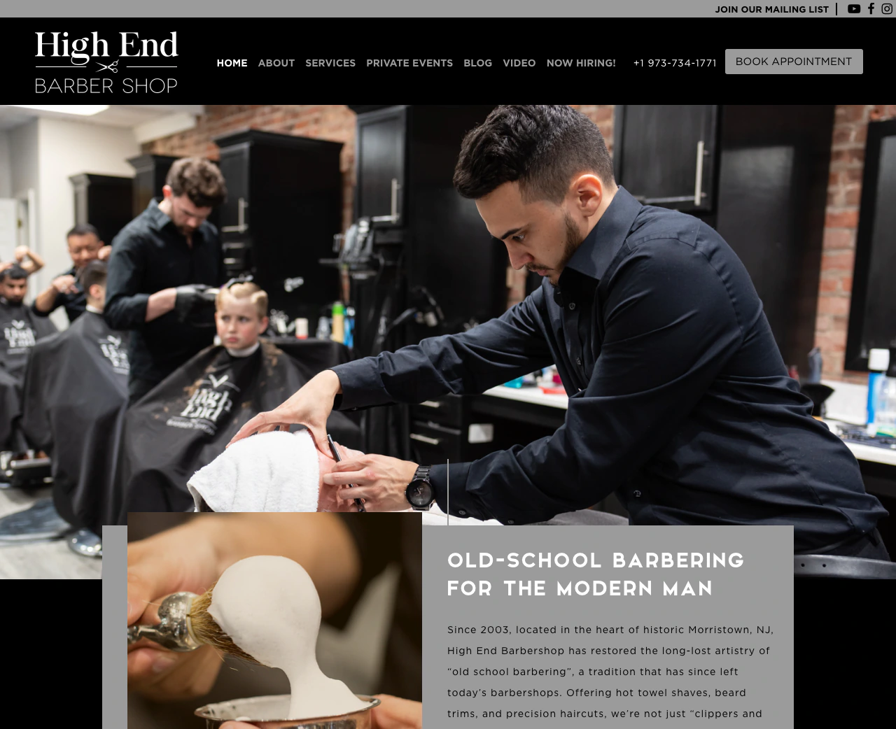 High End Barbershop homepage with a barber cutting a client’s hair